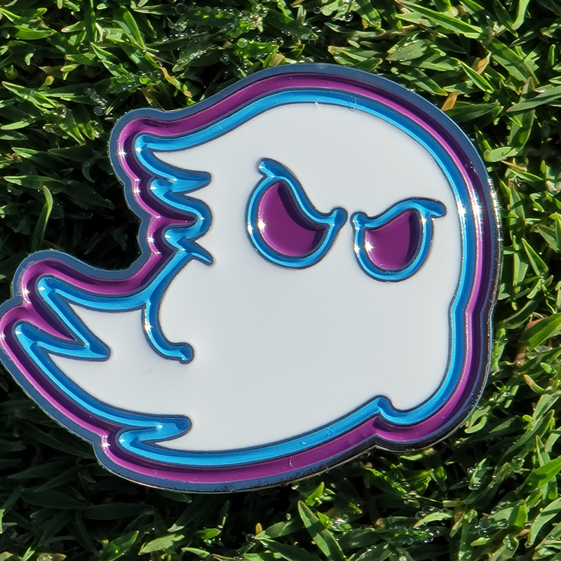 Custom golf ball marker we designed for Ghost Pest Control